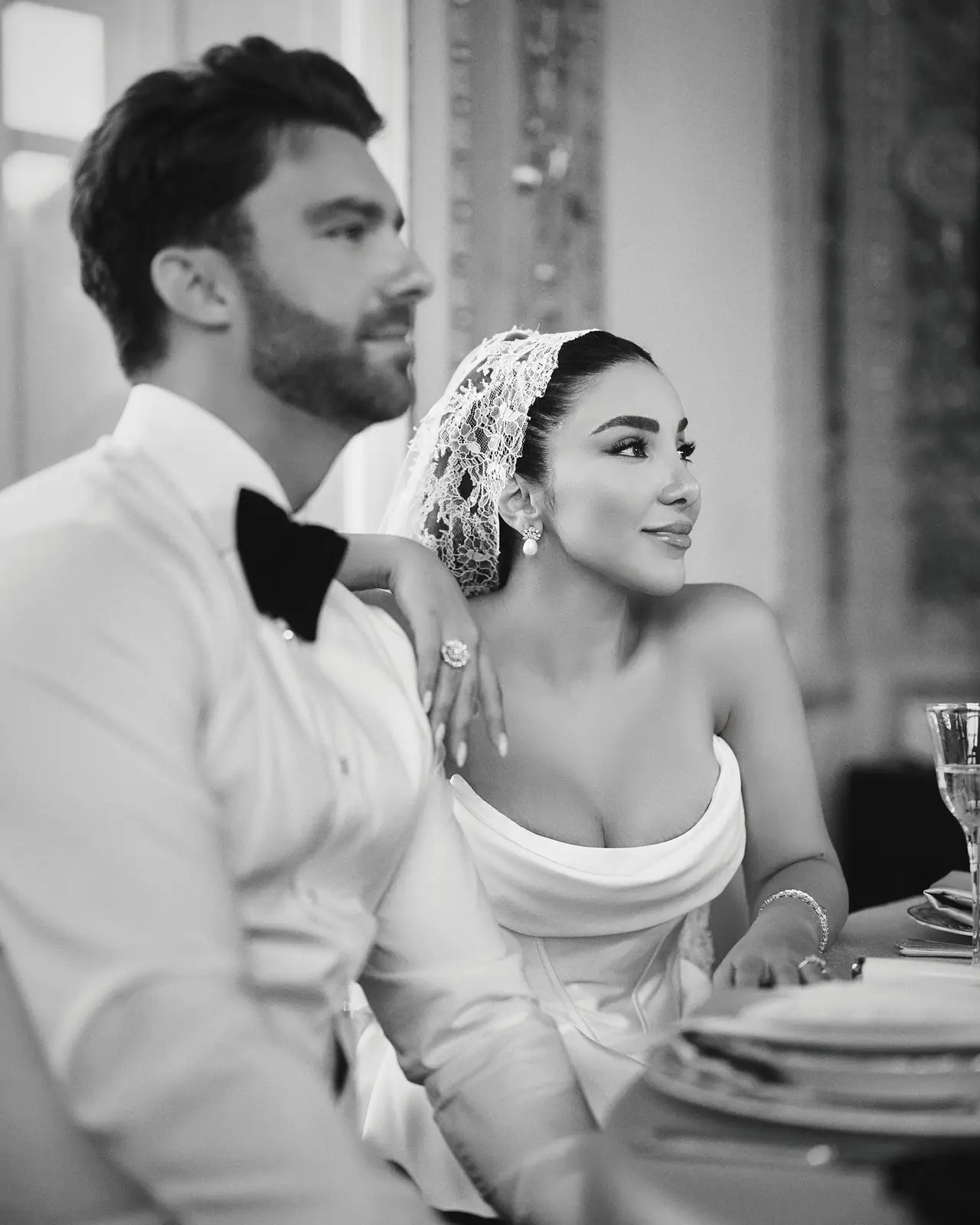 couple listening to speech at reception